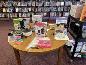 A display of kits at the library on a table