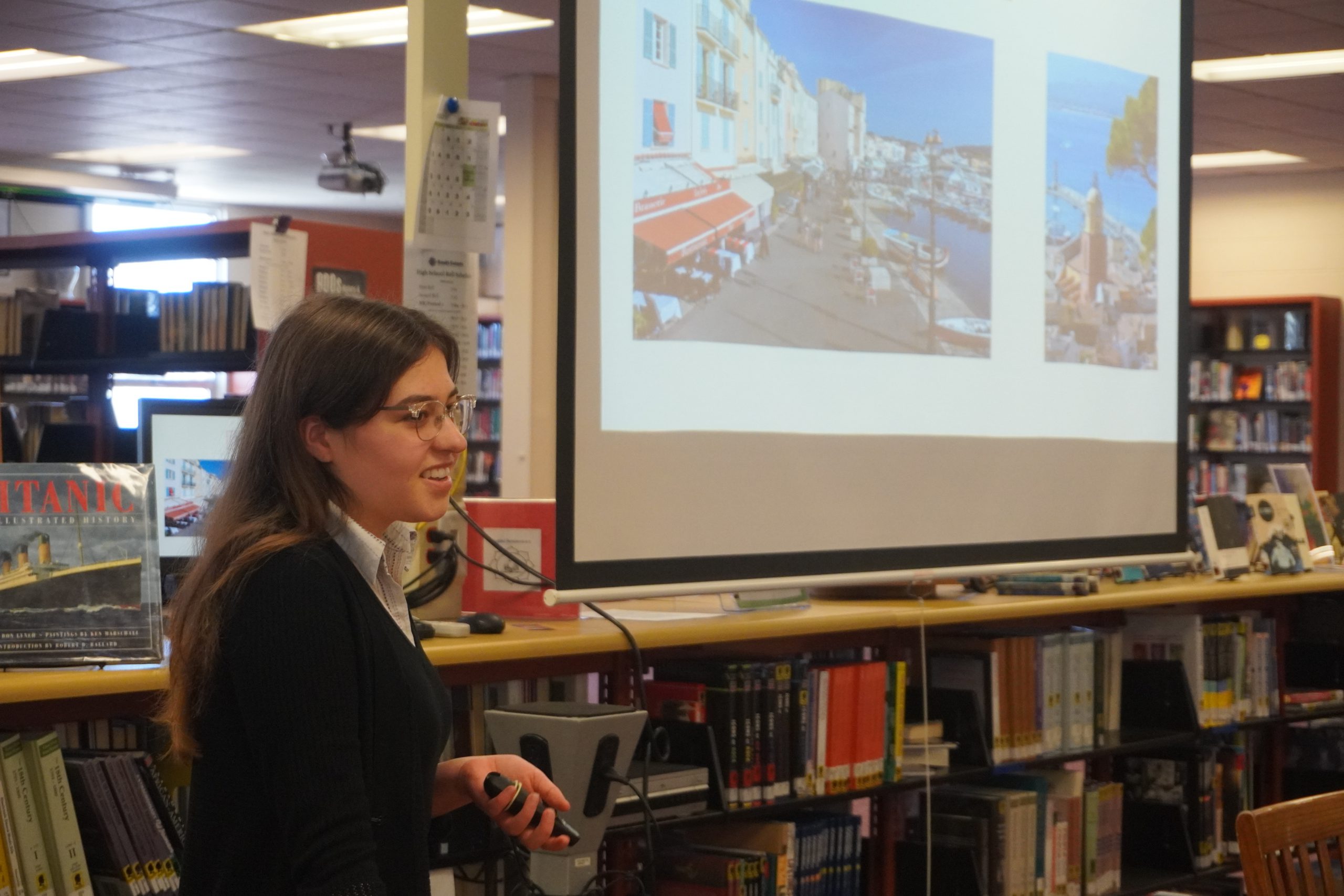 Student presents to panel in Polish