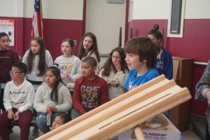 Shaker Road Elementary student waits for the results after their race