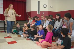 Shaker Road Elementary teachers hand out the eggs to their students