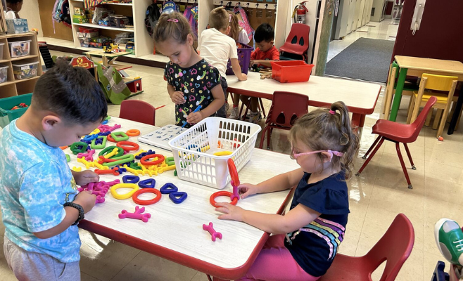 PreK students are working on various class work