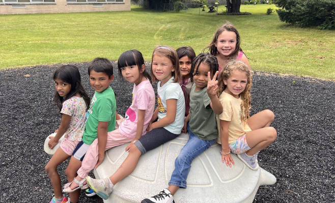 students playing outside on the playground