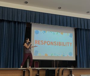 ENL Teacher teacher Brianna Gualtieri  welcome Forest Park to the Responsibility Assembly. 