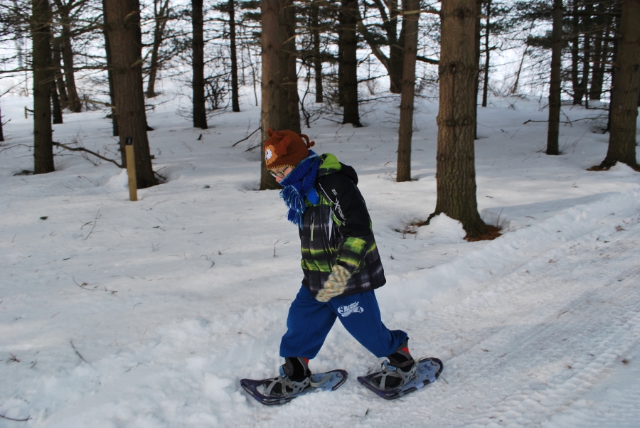 Student snow shoeing