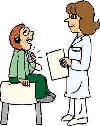 Pediatrician talking to child patient