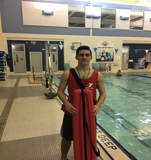 High School student working as a lifeguard