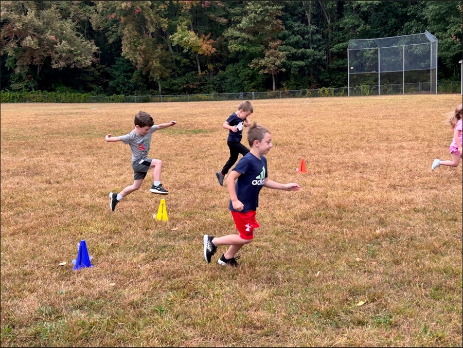 WSS kids running on the field