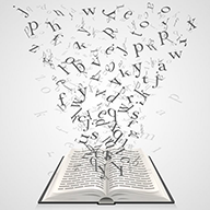 Book laying open with letters pouring off the pages.