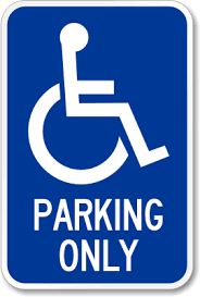Handicapped parking only street sign.