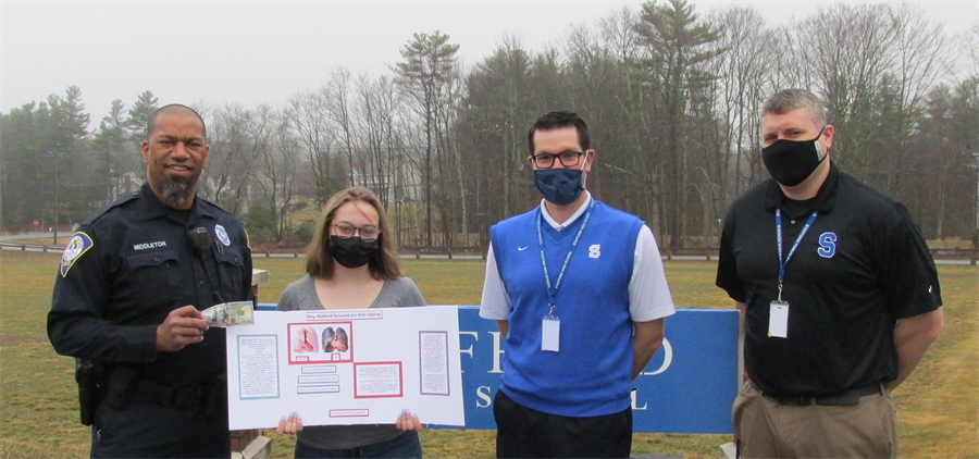 Student with Officer Middleton, Principal Pelliccia and Assistant Principal Kinel. Student with Officer Middleton, Principal Pelliccia and Assistant Principal Kinel.