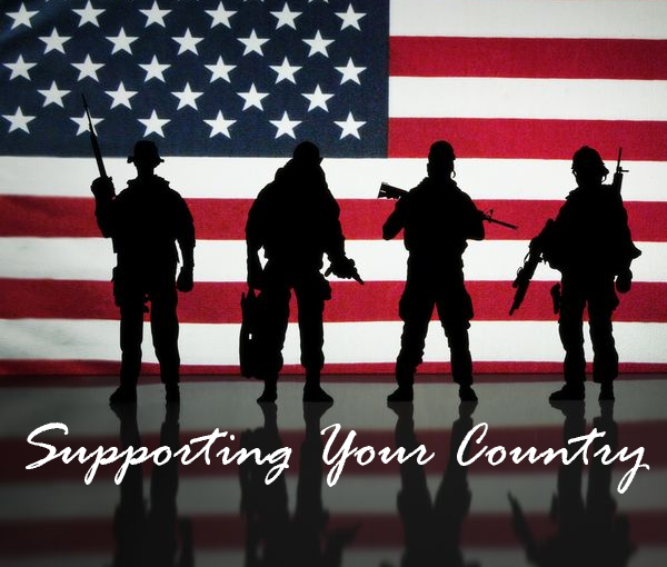 Image of the American flag with 4 silhouettes of soldiers standing in front. Beneath the reflection of the soldiers reads "Supporting your country".