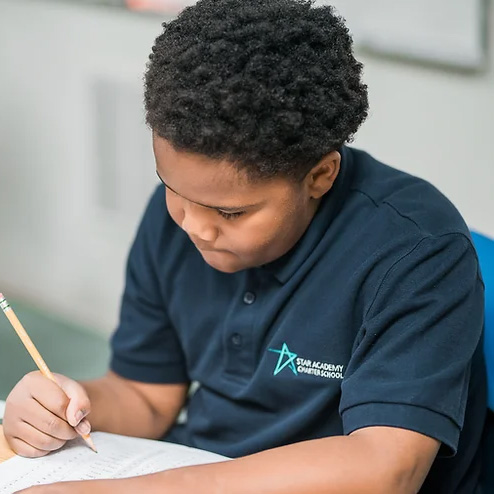 Boy working at desk