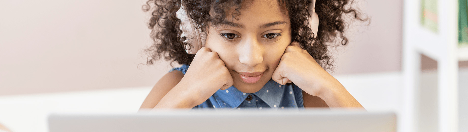 girl looking at laptop