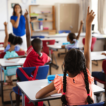 Students in classroom engaged in learning