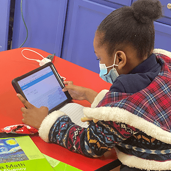 Girl looking at tablet