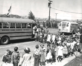 Students lining up to take the bus