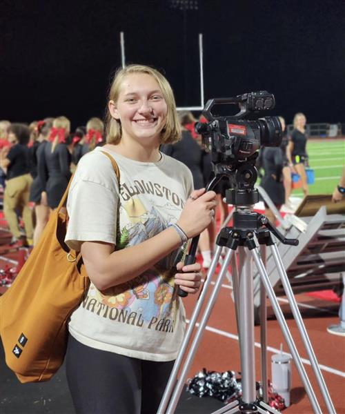 RTV student filming a football game