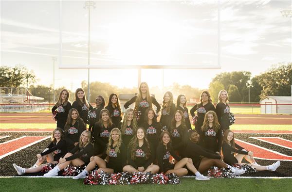 Varsity team picture with head coach