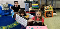 Students in grades K-3 at Merrimac Elementary riding in toy train. thumbnail266216