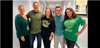 5 people pictured in hallway, one wearing mental health matters shirt thumbnail266739