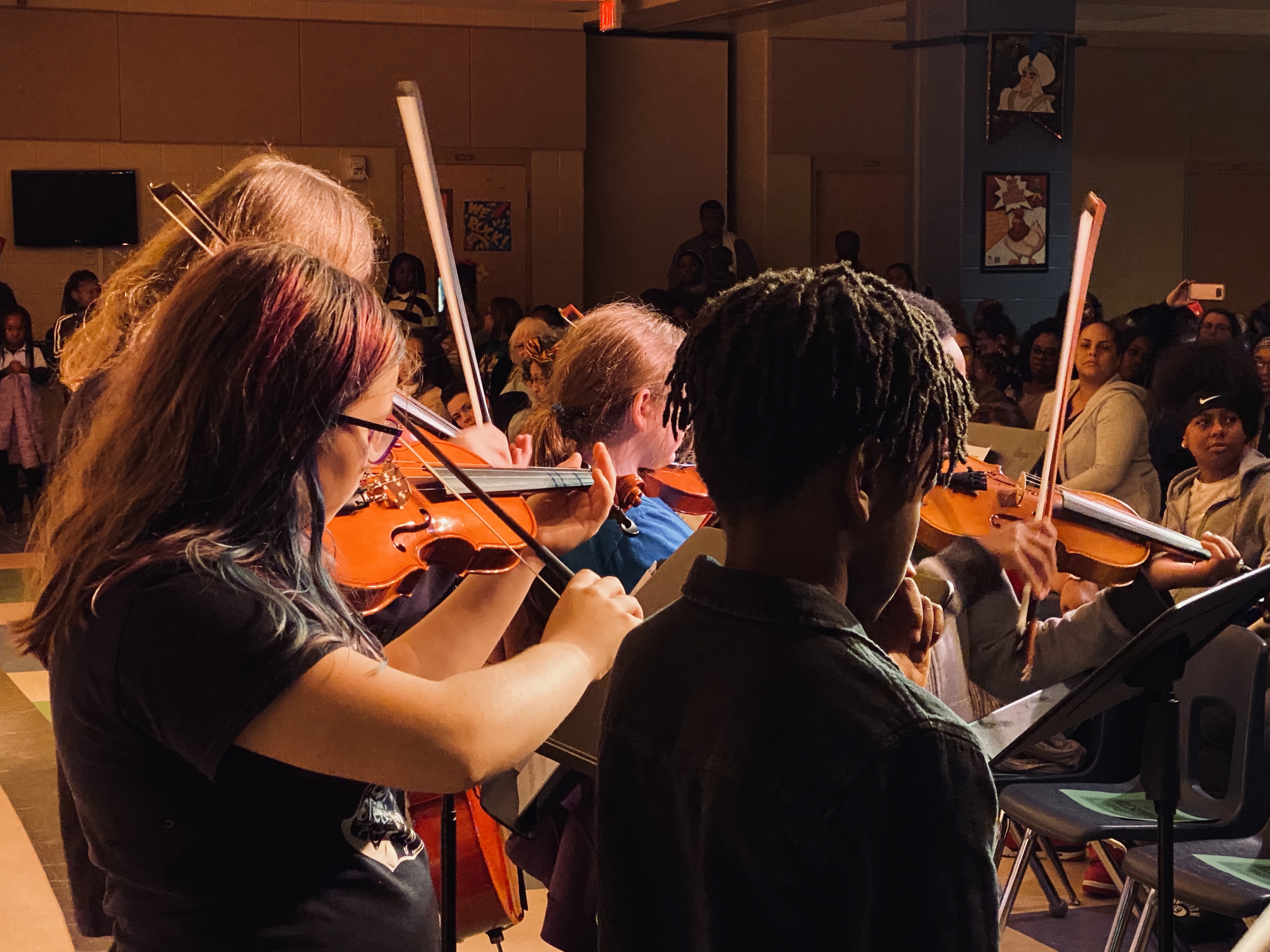 Students Playing Violen