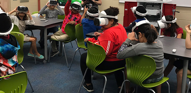 students using vr goggles