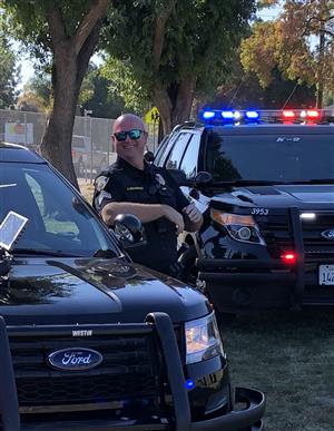 SPD sergeant gives a smile for the camera! SPD sergeant gives a smile for the camera!