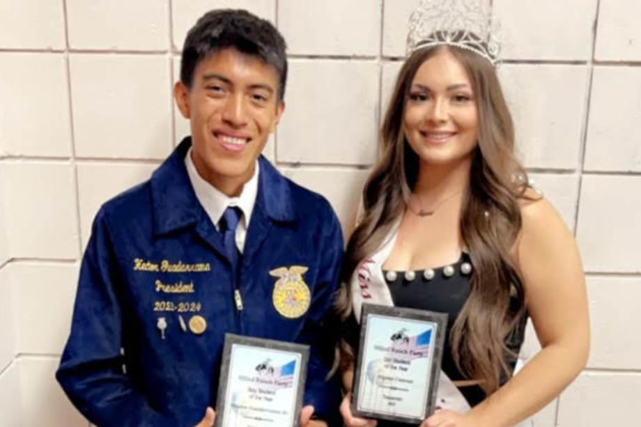  Boy & Girl of the year holding awards