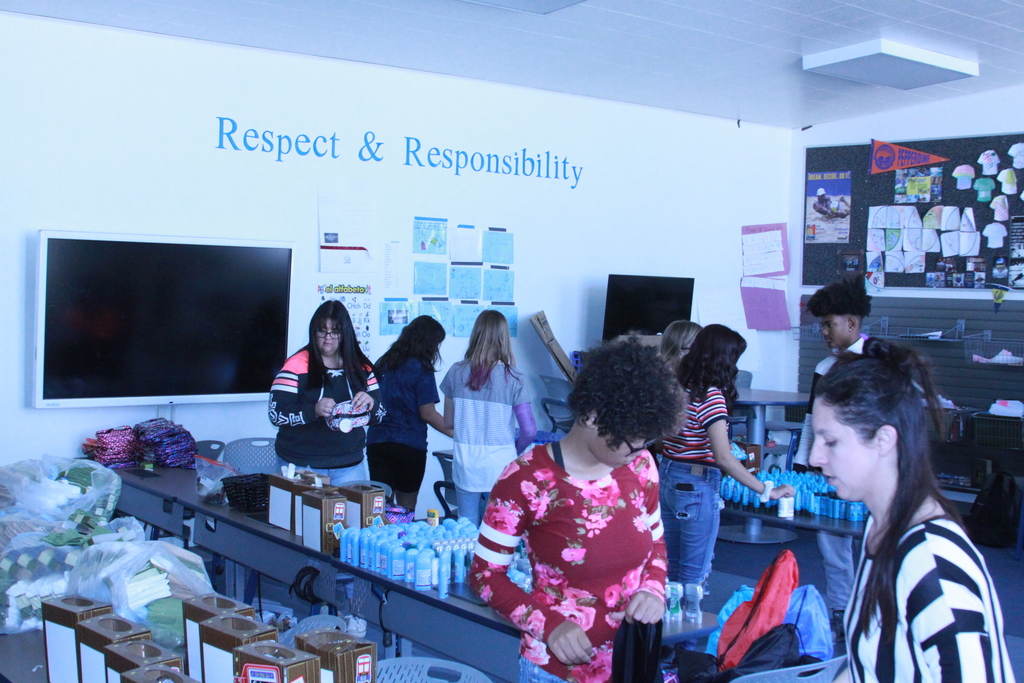 Seventh and nineth graders organizing and getting ready to put hygiene bags together.  Thank you SBC Wireless for all the supplies.s  