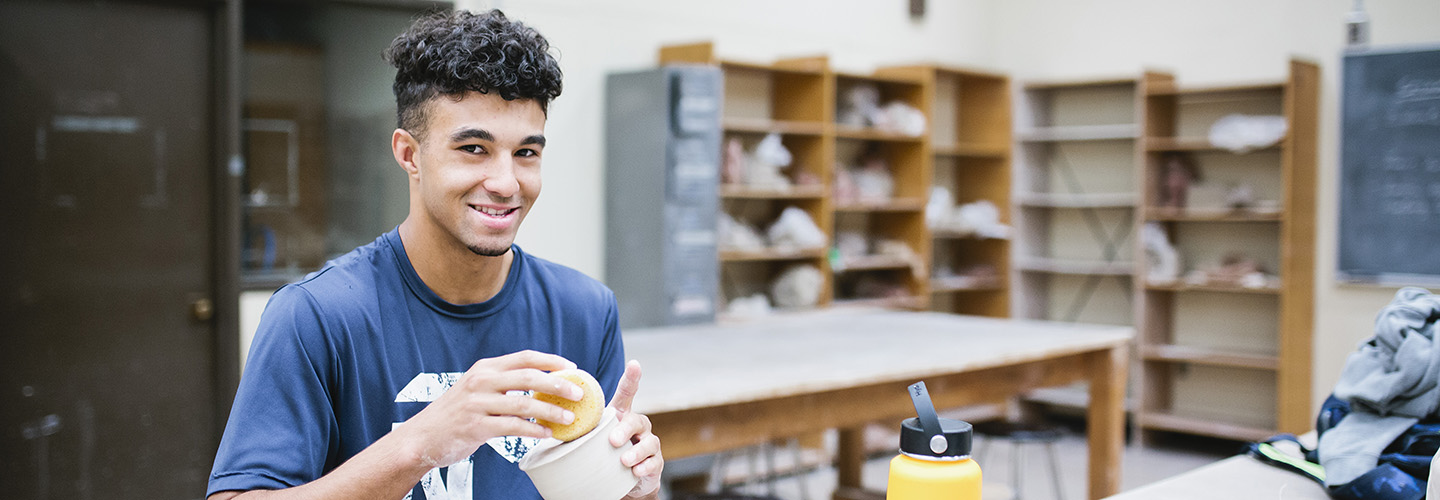 Student in art class