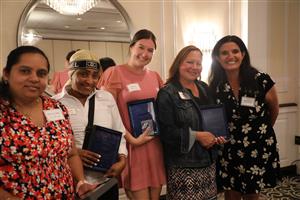 Vanguard staff and donors smiling for a photo