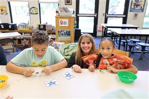 students and staff doing crafts