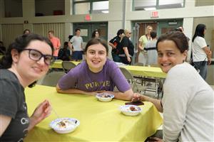 Vanguard students and staff smiling for a photo