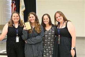 Vanguard staff and students smiling for a photo