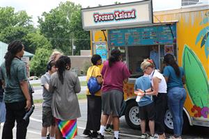 Food truck serving food to Vanguard students
