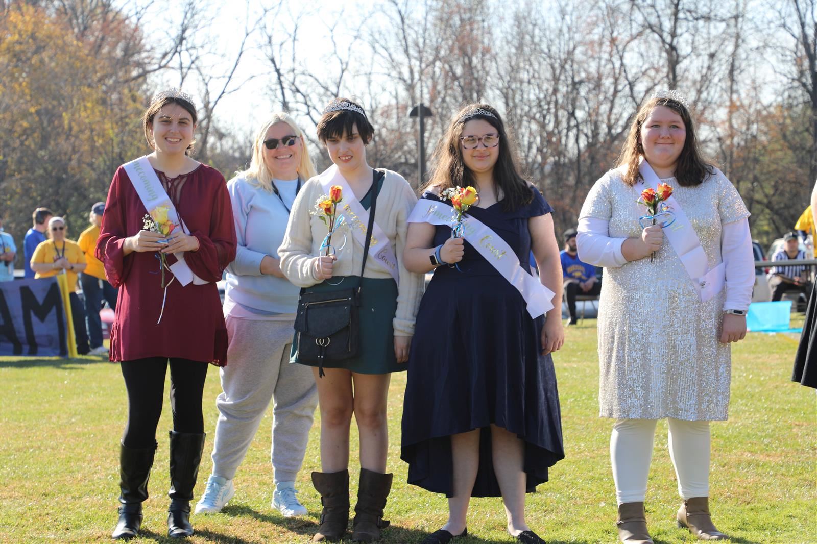 students posing at homecoming