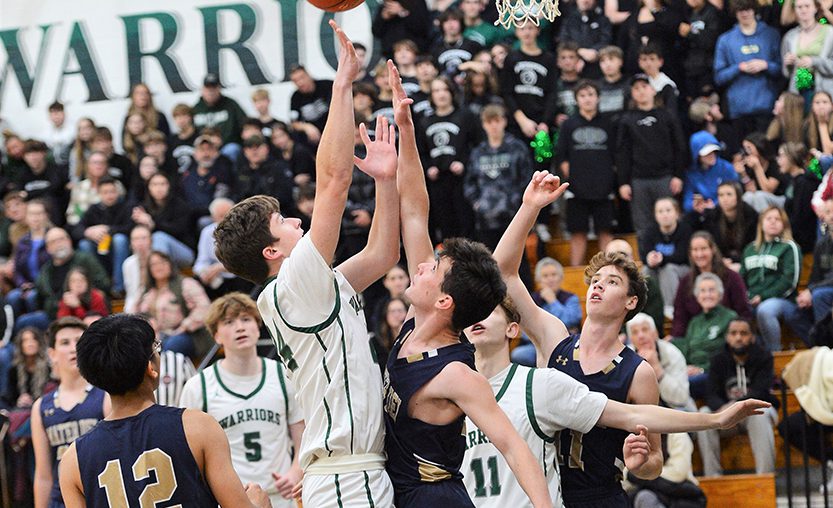 New bball A Weedsport student shoots during a 2022 basketball game at the Jr.-Sr. High School