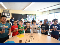 7 Elementary Students standing around table thumbnail265919