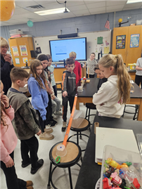 student with recently created Rube Goldberg machines thumbnail264918