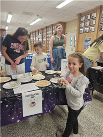 Students and parents in hallway for Night Under the Stars. thumbnail265948