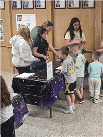 Students and parents in hallway for Night Under the Stars. thumbnail265949