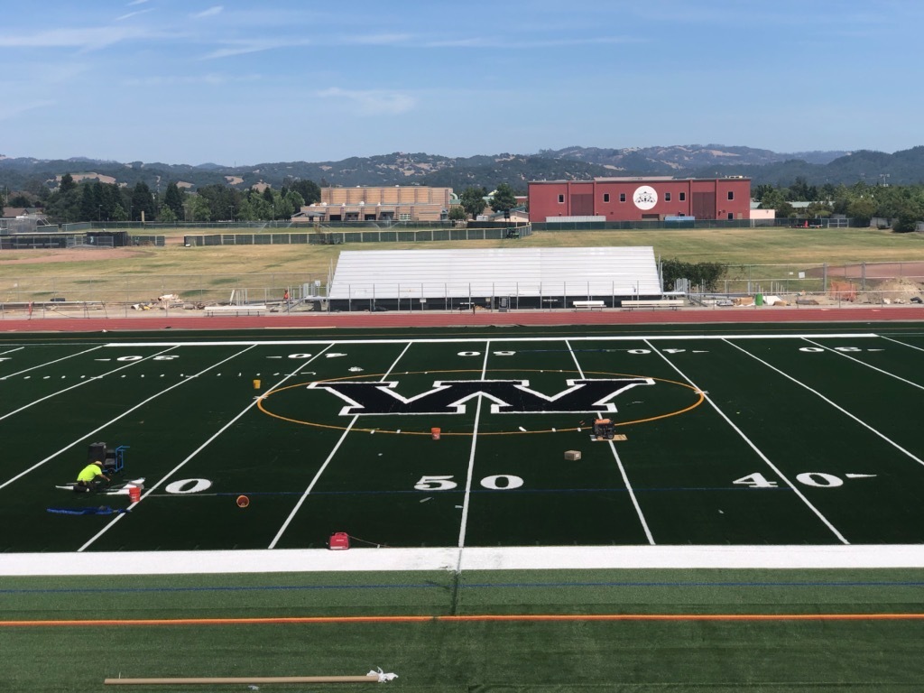 New Football Turf with yard lines and the big "W" on the 50