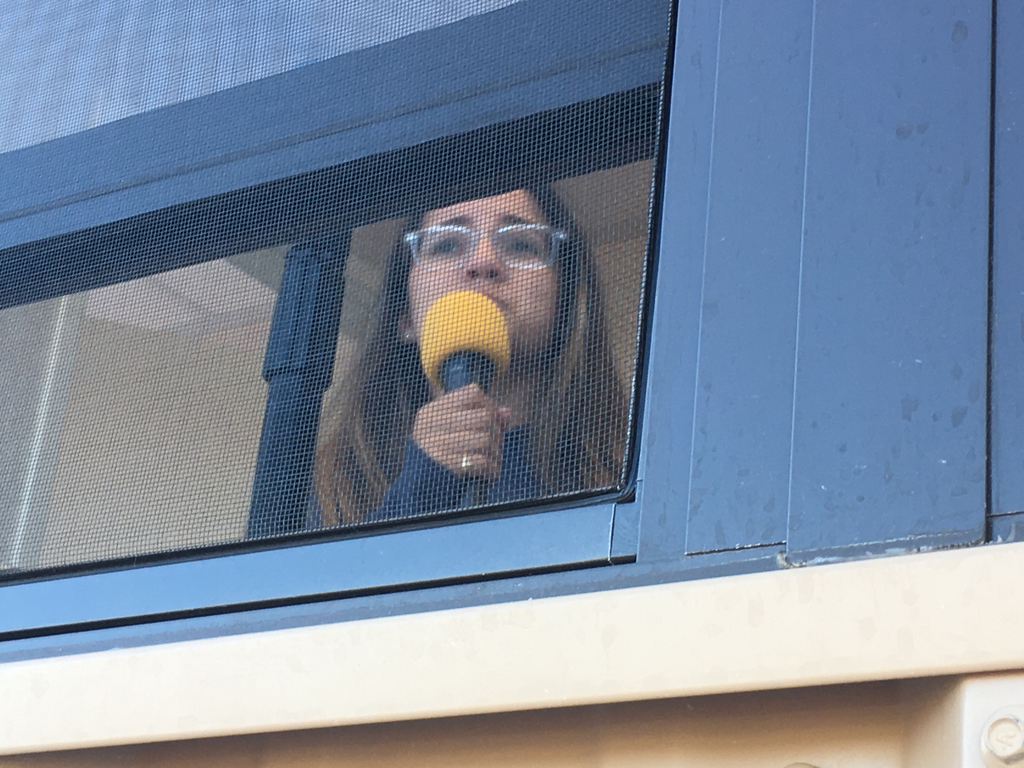 Student singing the Star Spangled Banner