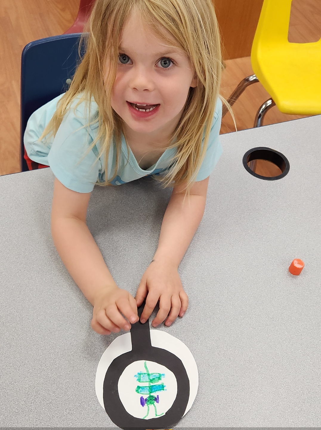 Little girl doing art at camp