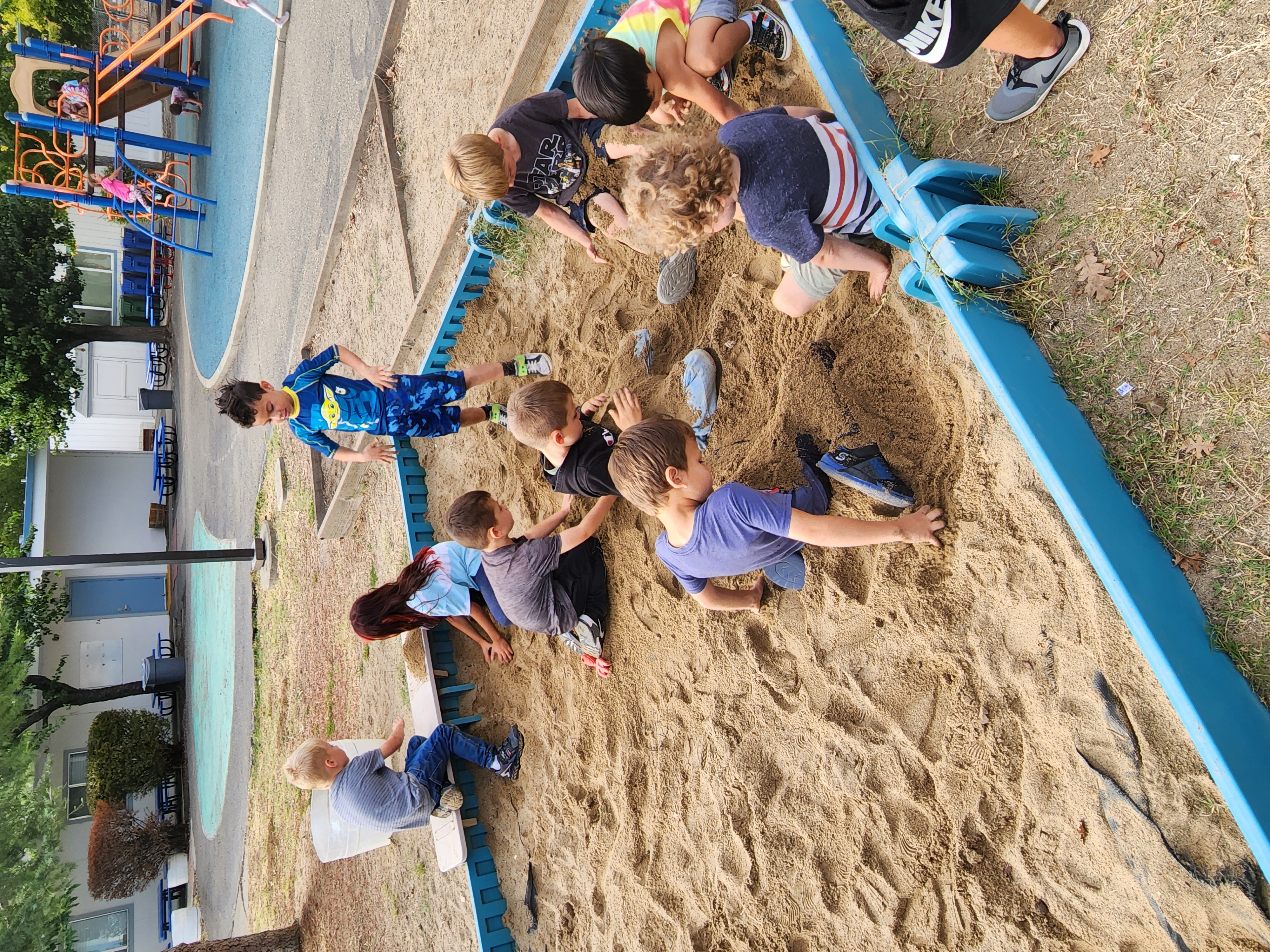 kids playing in sandbox