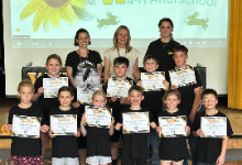 Group of children holding certificates