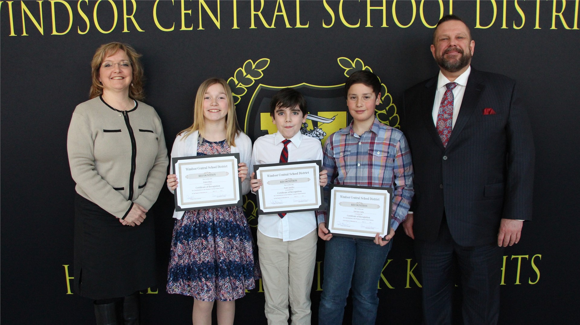 5th-grade students Garrison Calta, Grace Deyo, Sophia Chen and Noah Sandhu