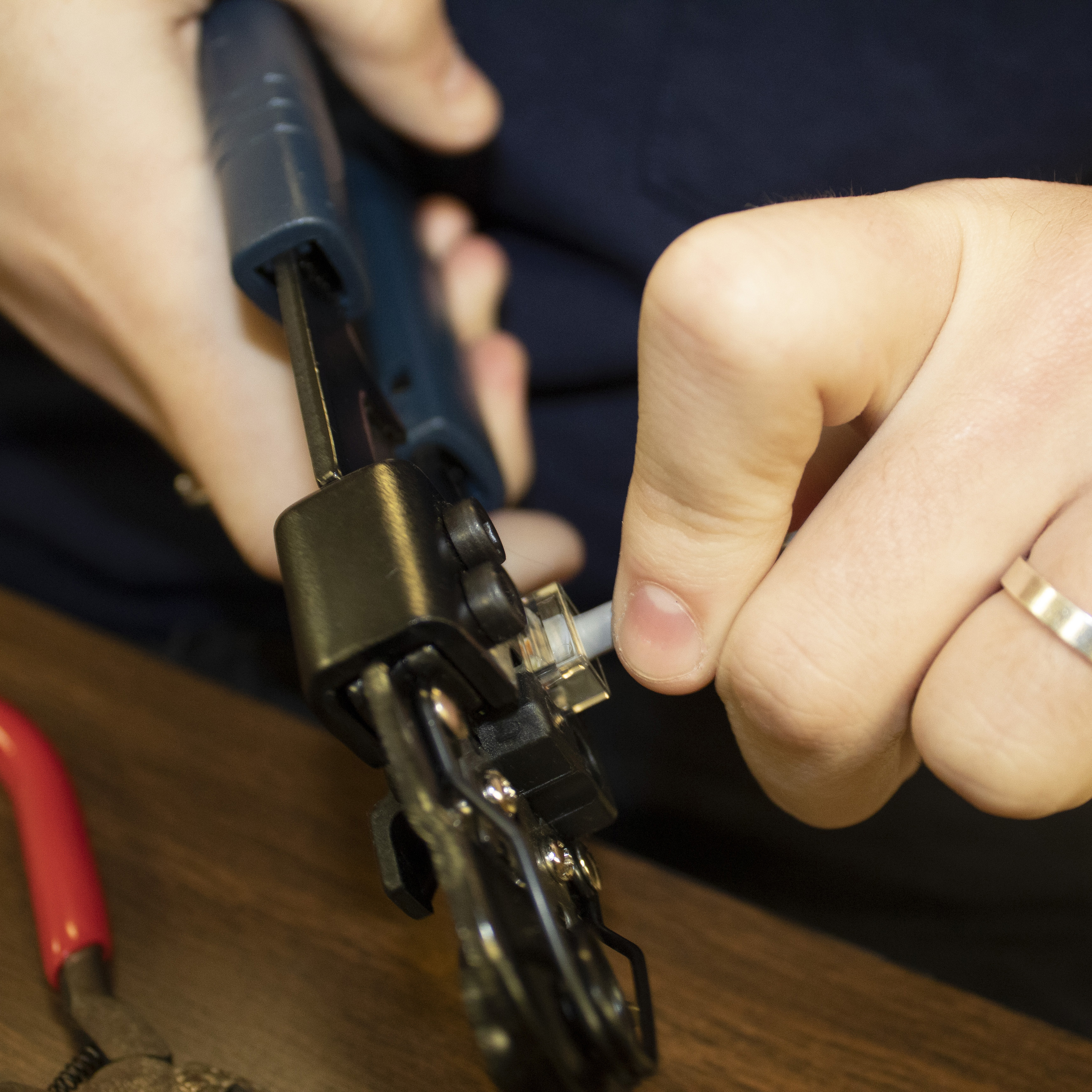 student building a network cable