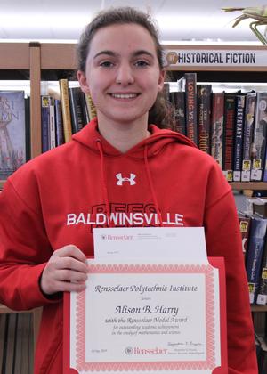 girl holding a certificate