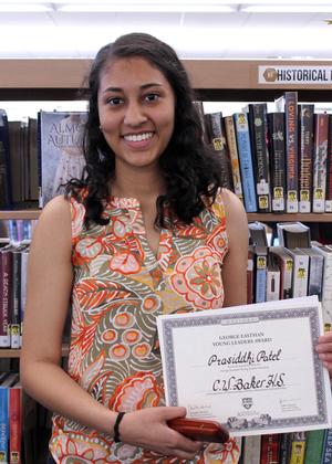 girl holding a certificate